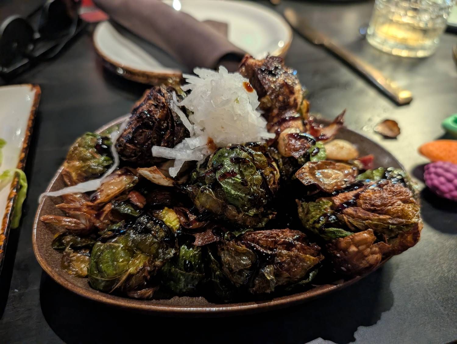 Crispy Pancetta Brussels Sprouts at Stingers Lounge - Restaurant, Bar, & Golf Simulators