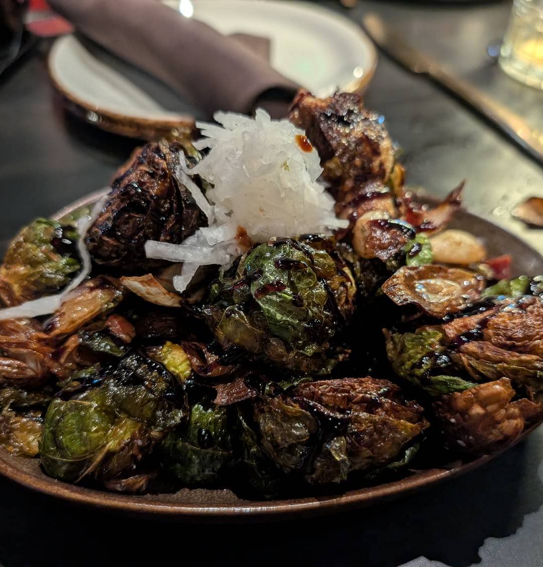 Crispy Pancetta Brussels Sprouts at Stingers Lounge - Restaurant, Bar, & Golf Simulators
