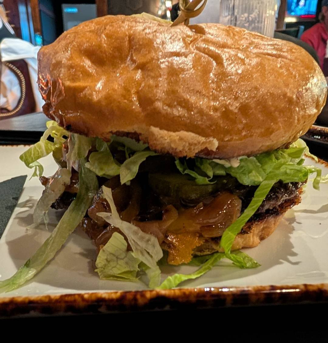 Stingers Bourbon Smash Burger at Stingers Lounge - Restaurant, Bar, & Golf Simulators